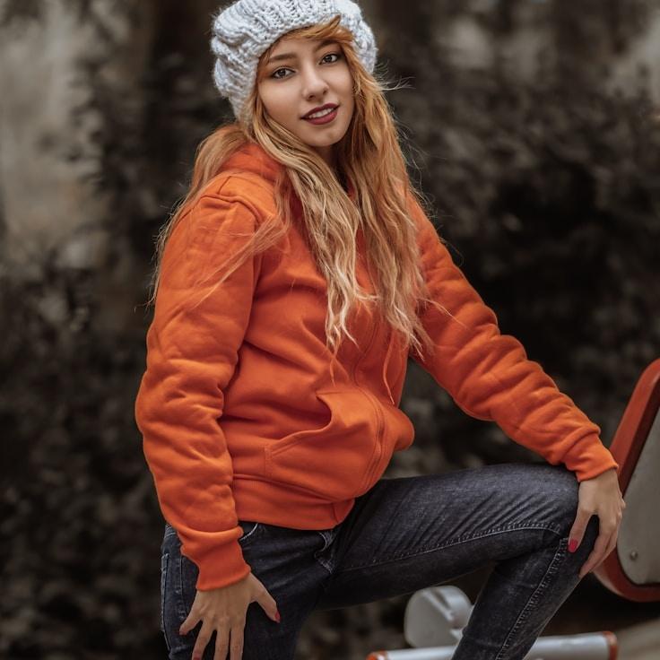 Kaveri Mehta, Lead Design Curator at SageCrestGarden, reviewing corporate floral arrangements